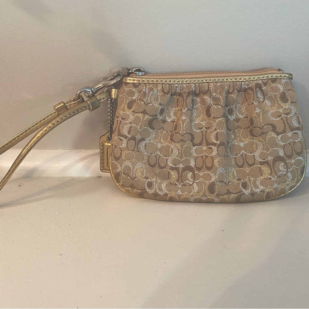 Coach gold wristlet